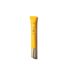 A tube of sunscreen cream on a black background