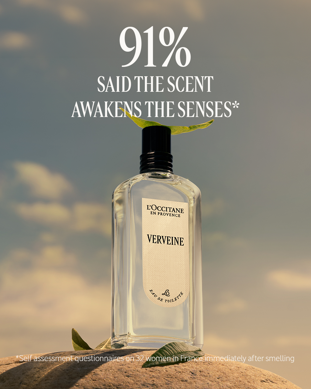 L'Occitane Verveine perfume bottle with a nature-themed background