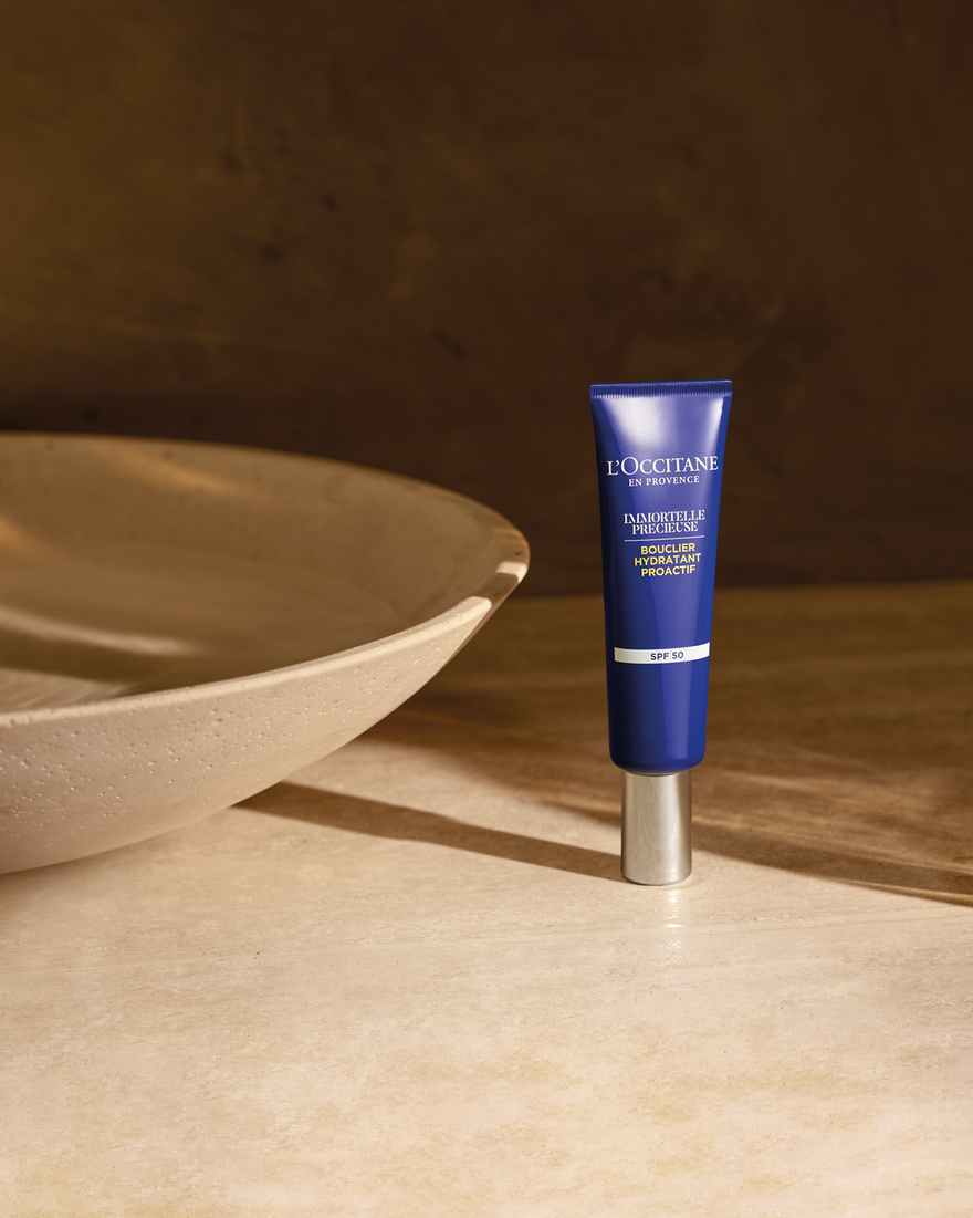 Tube of cream sitting on a counter next to a bowl - Illustration 2