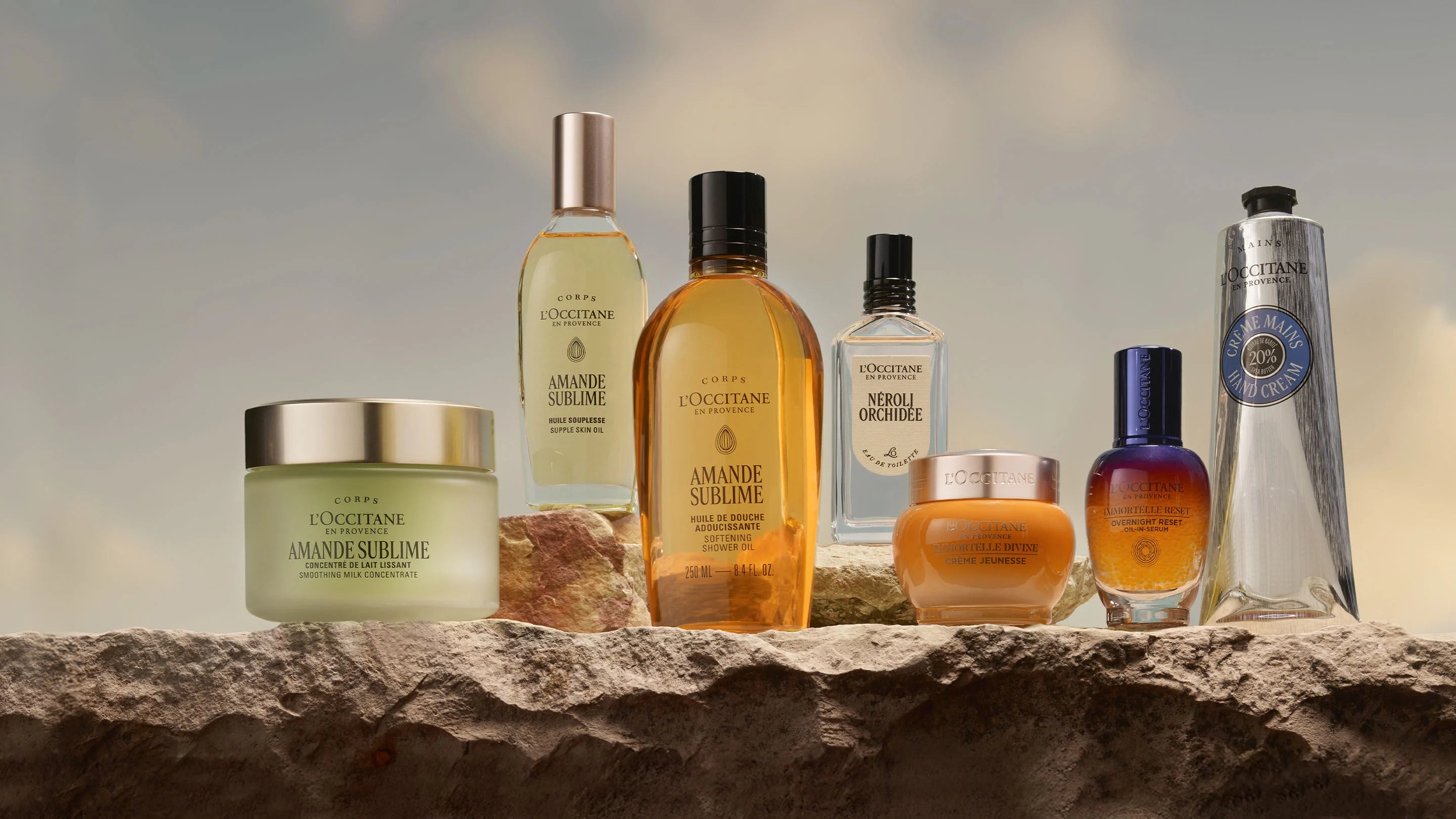 Many different types of skin care products sitting on a ledge